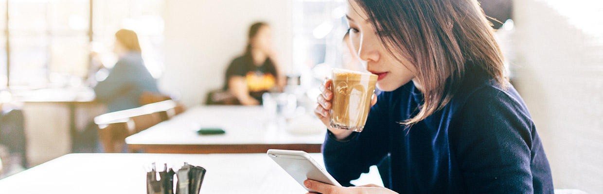 Woman is drinking coffee, image used for HSBC Philippines Ways to bank