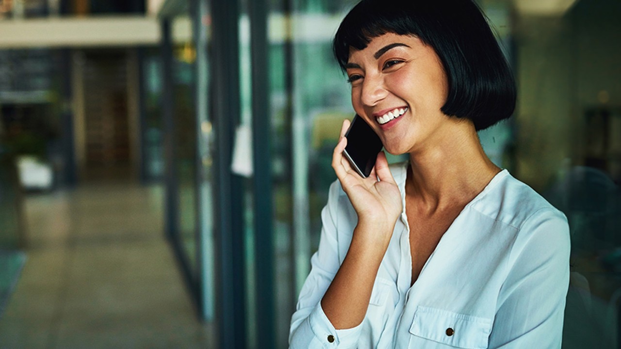 phone girl smile; image used for HSBC ways to bank