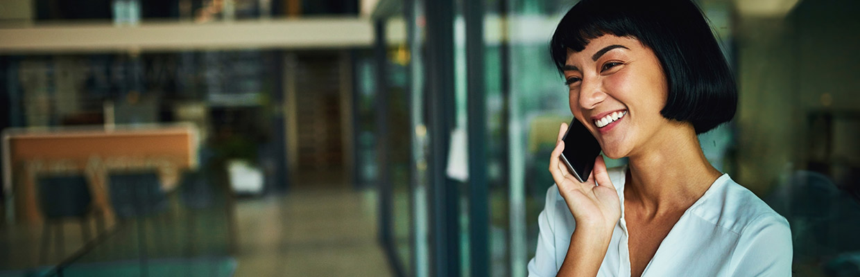 A girl is talking on phone, image used for HSBC Philippines Telephone banking page
