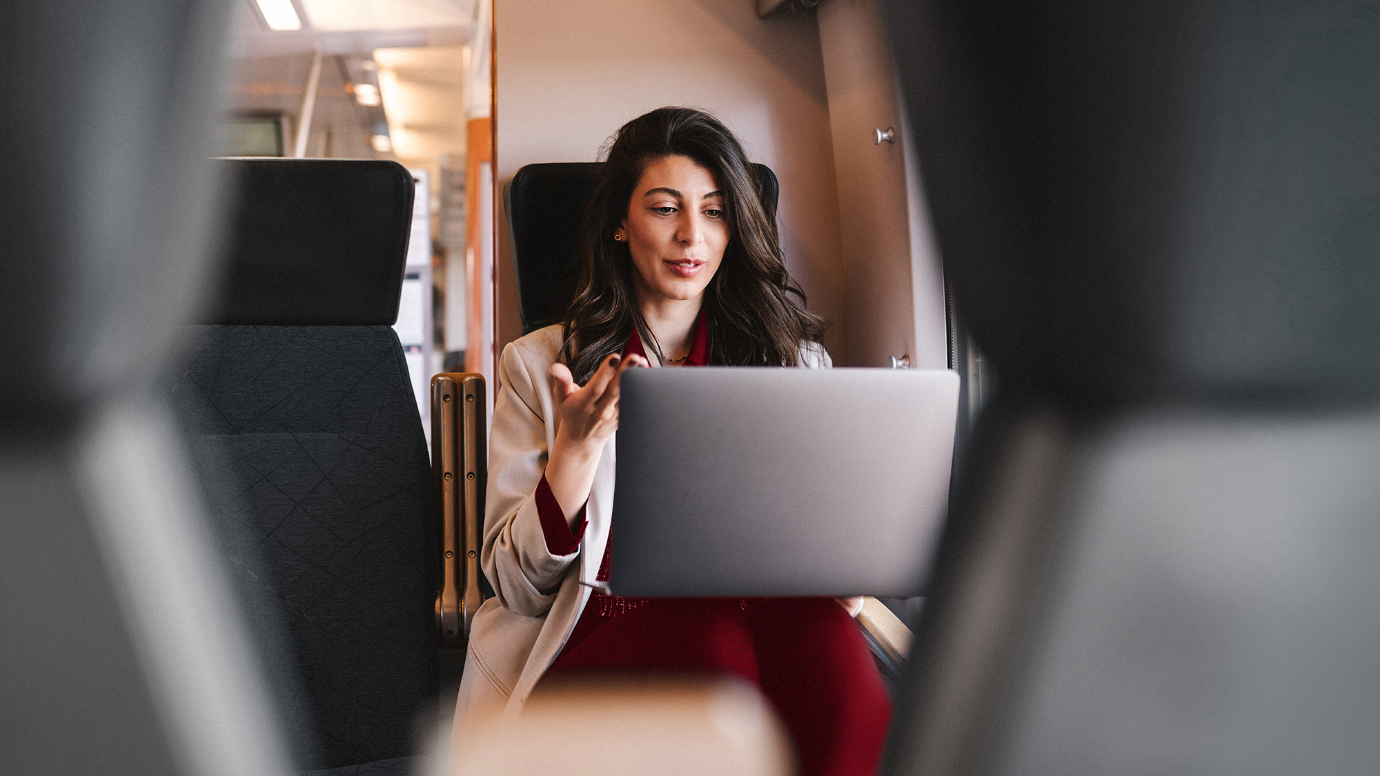 Lady at airport lounge on computer