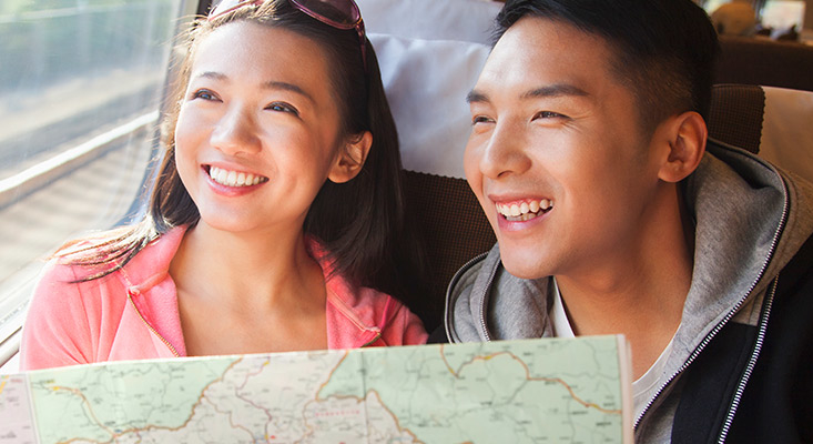 Couple on train; image used for HSBC Philippines Get an additional card