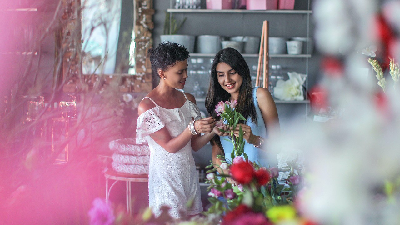 Women in a flower shop; image used for HSBC Credit Card Rewards Explained article page