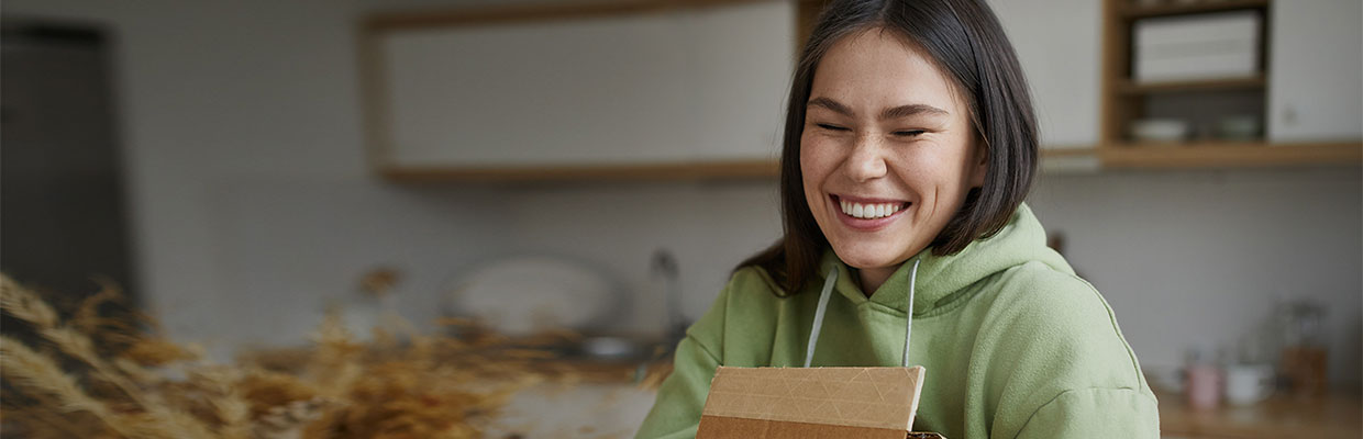 Happy woman smiling; Image used for HSBC Platinum Visa Rebate Credit Card Rewards