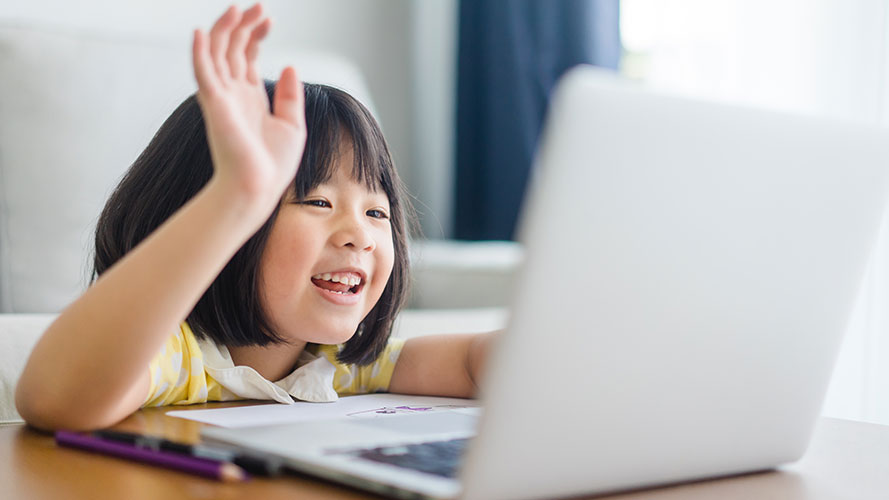 Child playing on computer