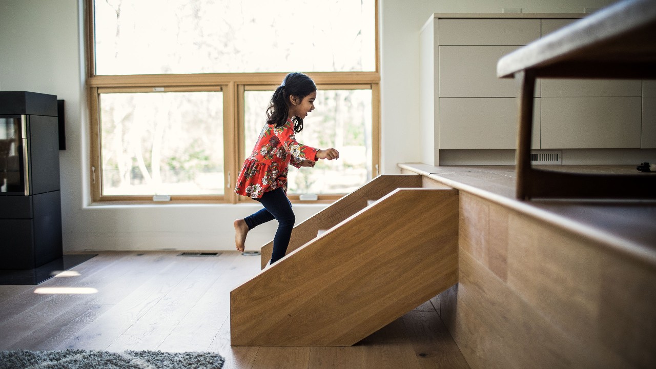 child running up steps