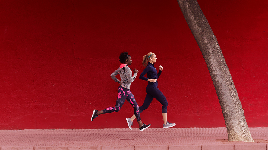 Two women running; Image used for HSBC Global Banking for Filipinos page - International Bank in the Philippines